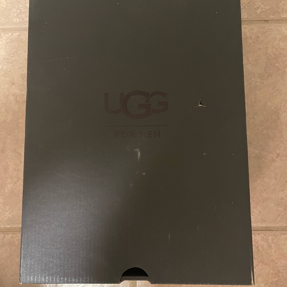 Men’s Classic Boot Uggs in black color way! Size 12 Men. Unworn and Brand New!!